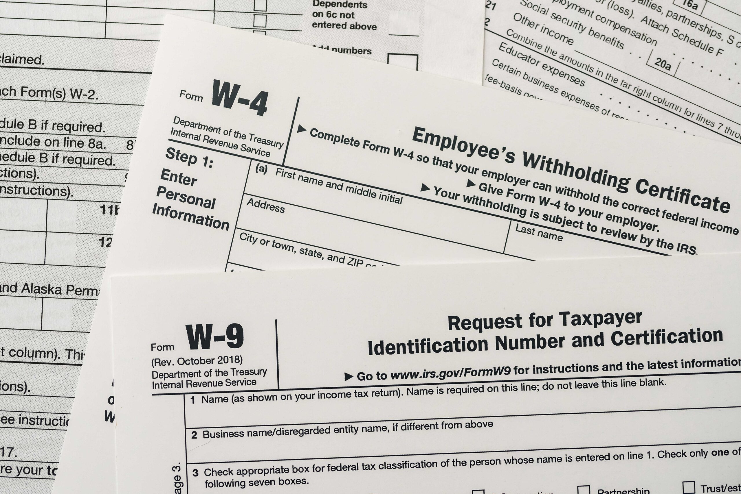 What is the difference between a W-2, W-3, W-4, W-8 and W-9